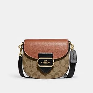 COACH MORGAN SADDLE BAG IN COLORBLOCK SIGNATURE CANVAS (COACH CE565)